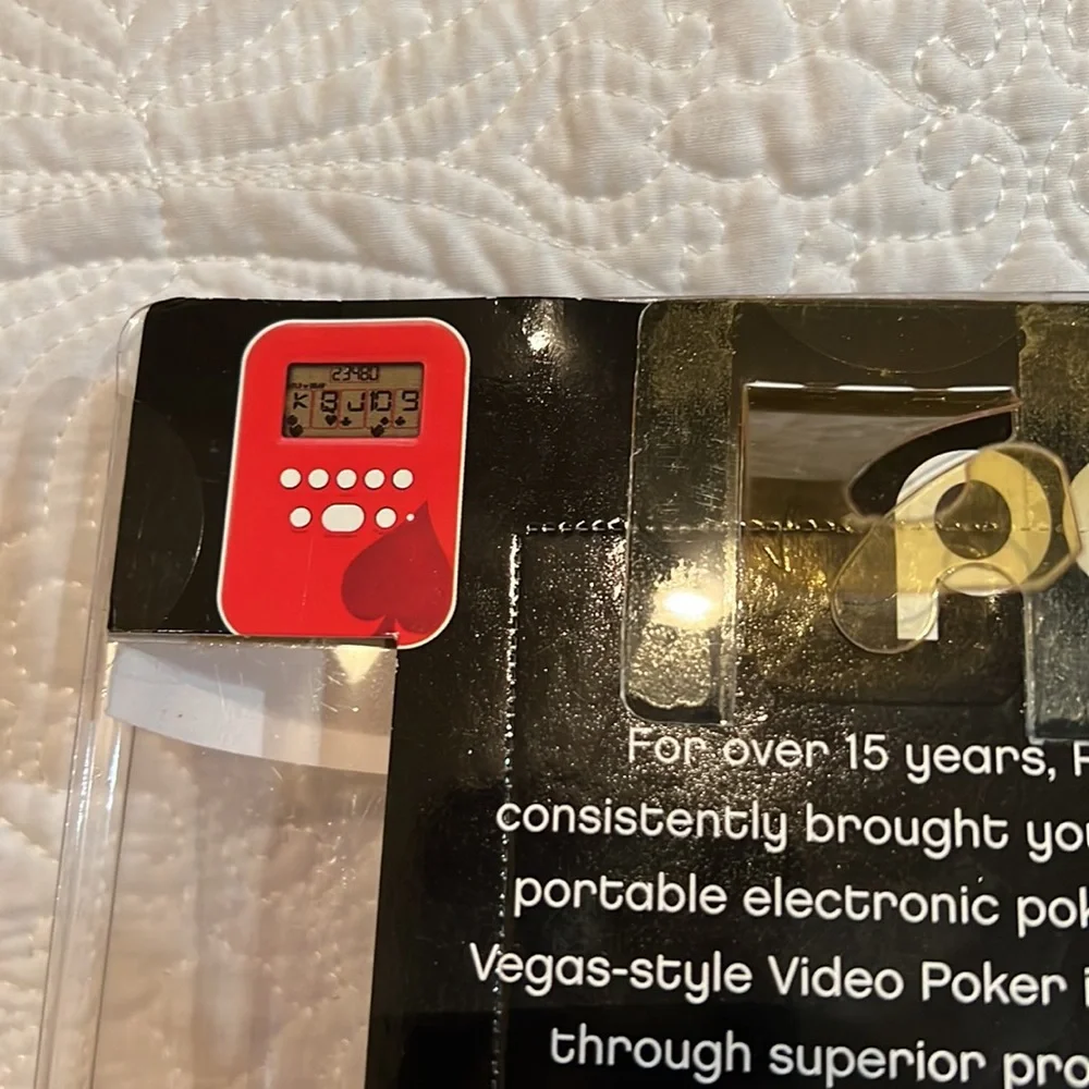 Radica poker lighted game, new in package‎